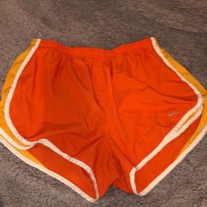 Orange Nike shorts